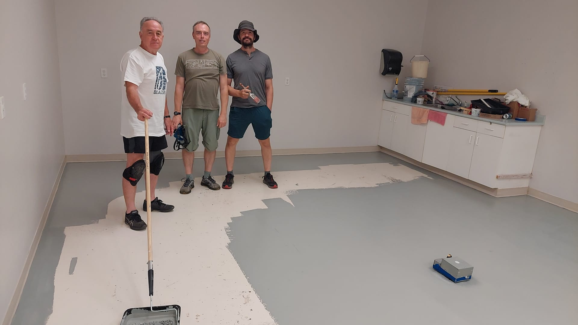 Painting the floor.